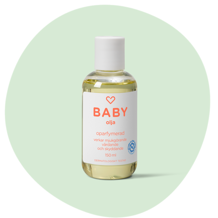 Flaska med oparfymerad babyolja, 150 ml, med texten "verkar mjukgörande, vårdande och skyddande" på vit etikett.